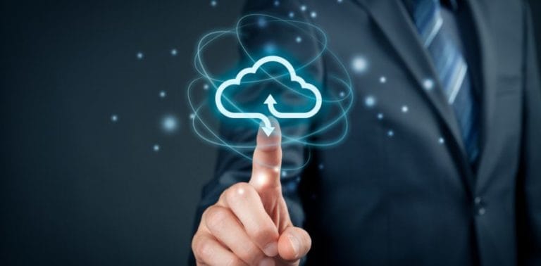 Person's finger pointing at cloud icon