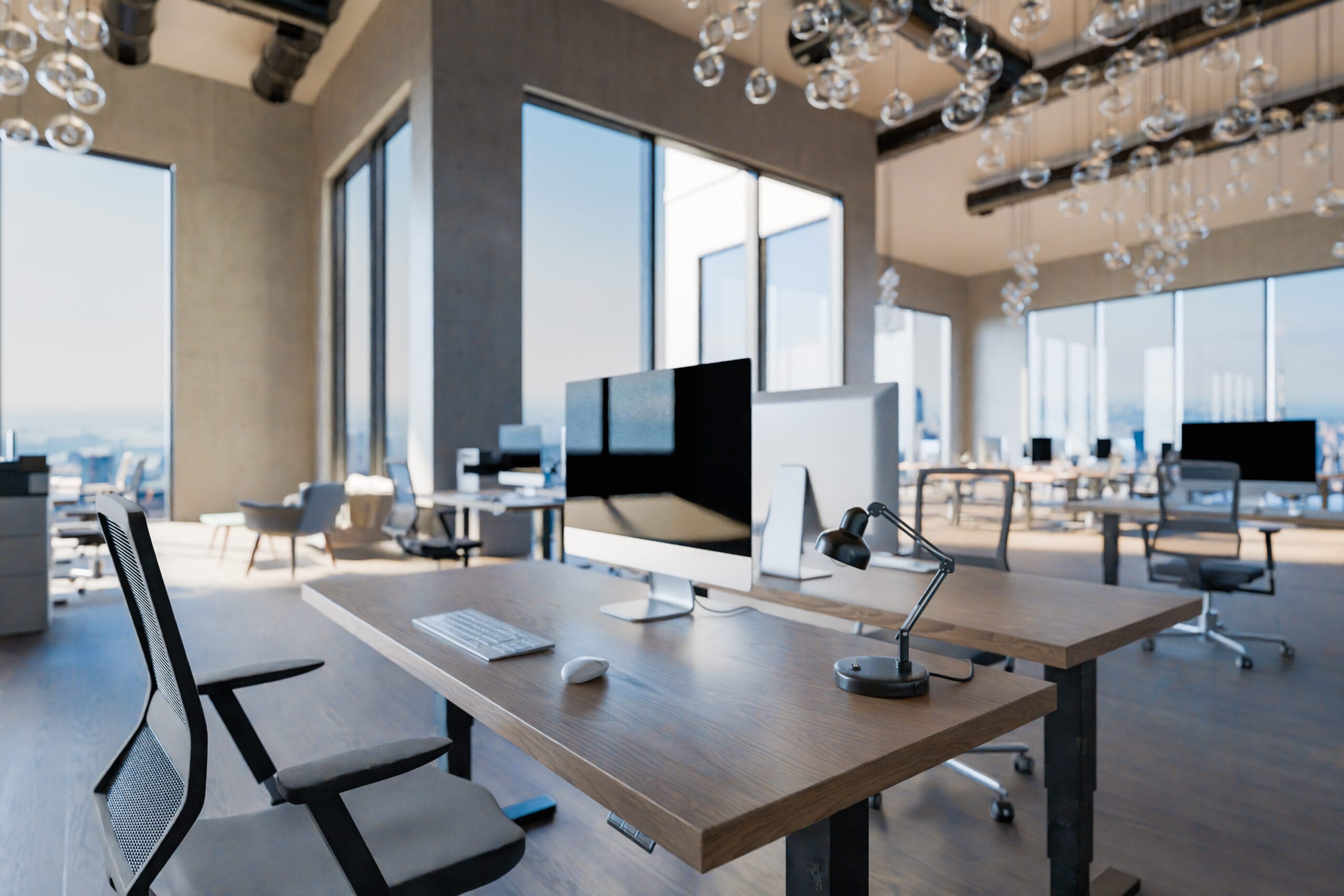 Large modern office with laptops