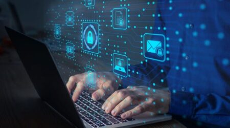 Data Protection and Security Person using computer with digital security icons IT Assessments