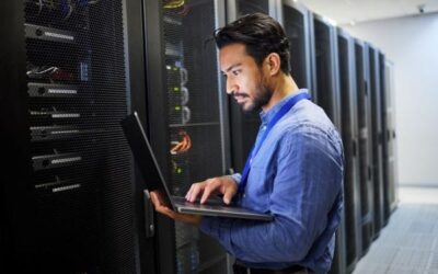 IT Network Server Engineer IT Network Server Engineer working on server rack