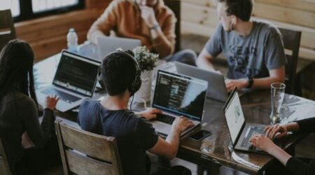 IT Services for Technology SaaS IT Services For Technology & SaaS Group of developers working in laptop
