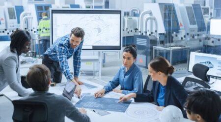Group of scientists working together in conference room