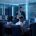 Cybersecurity analysts working in security operations center Managed Cybersecurity Team working in security operations center