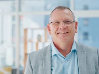 Manufacturing Testimonial Manufacturing firm leader testimonial white male with glasses in suit